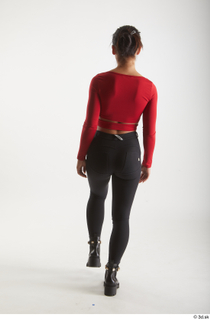  Zuzu Sweet  1 back view black boots black trousers casual dressed red long sleeve t shirt walking whole body 0003.jpg